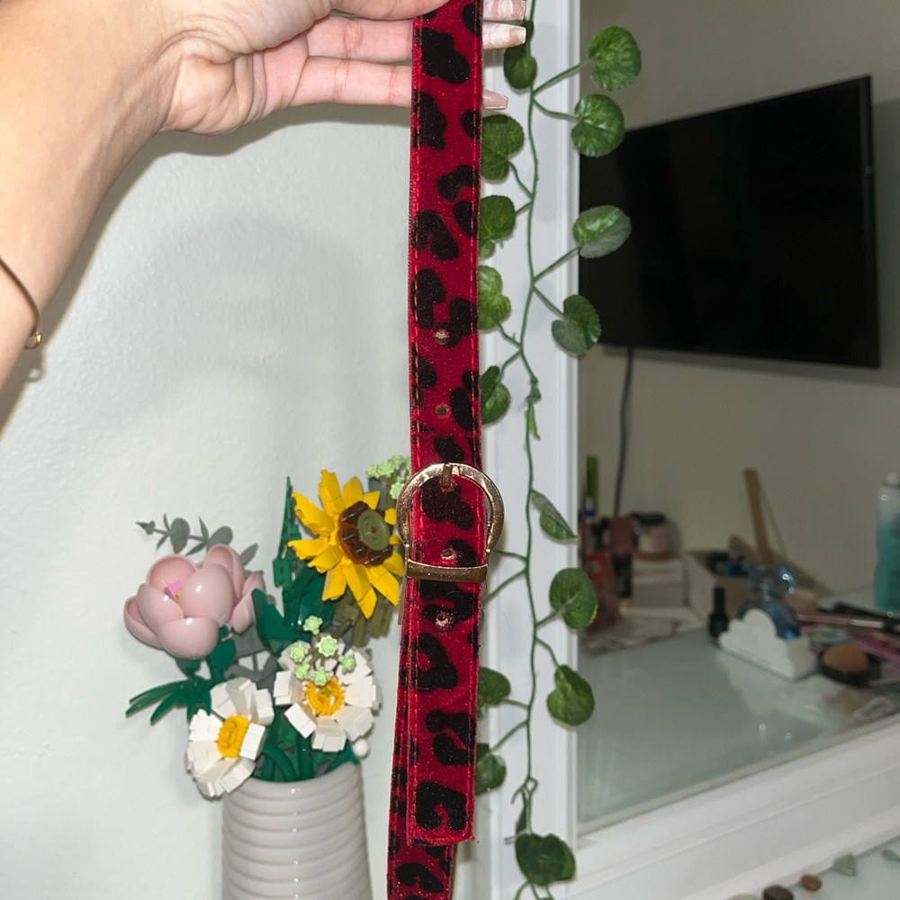 black and red animal print belt